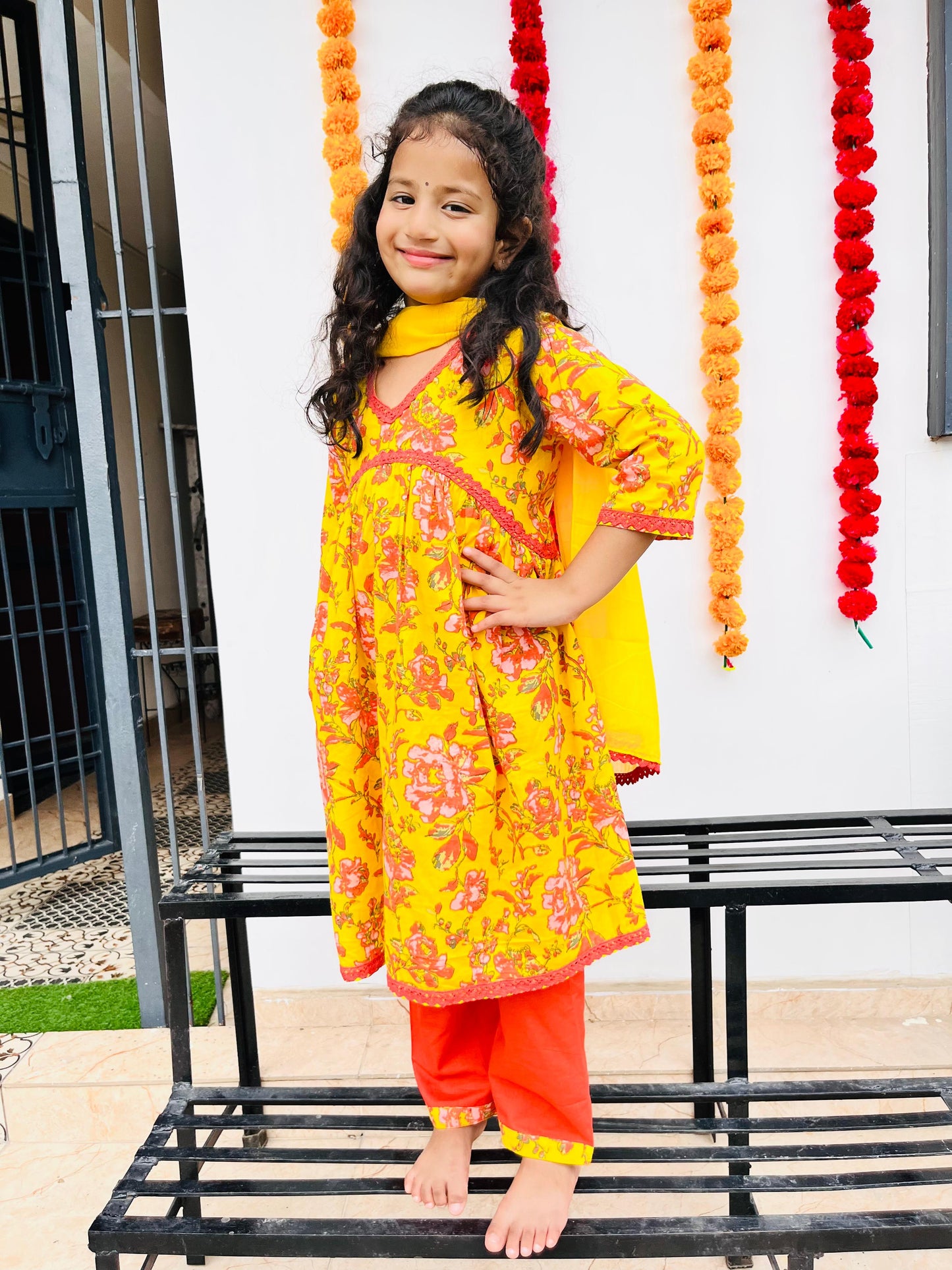 Yellow Colour Floral Printed Girls Flared Suit Set