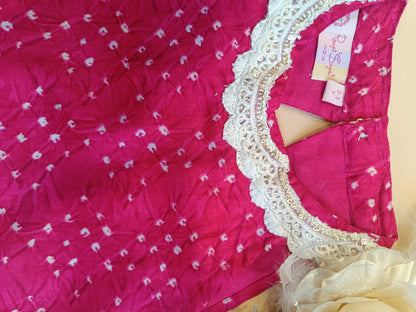 Rani Pink Coloured Bandhej halter neck kurti with Farshi salwar.