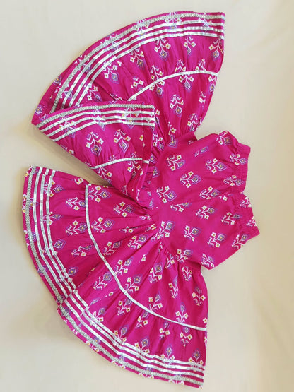 Patola printed, Pink colored flared kurti with sharara and dupatta