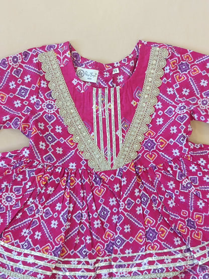 Patola printed, Pink colored flared kurti with sharara and dupatta