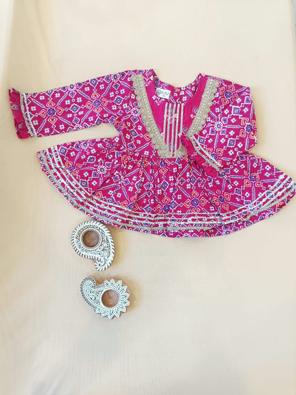 Patola printed, Pink colored flared kurti with sharara and dupatta