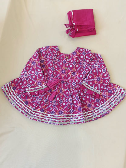 Patola printed, Pink colored flared kurti with sharara and dupatta