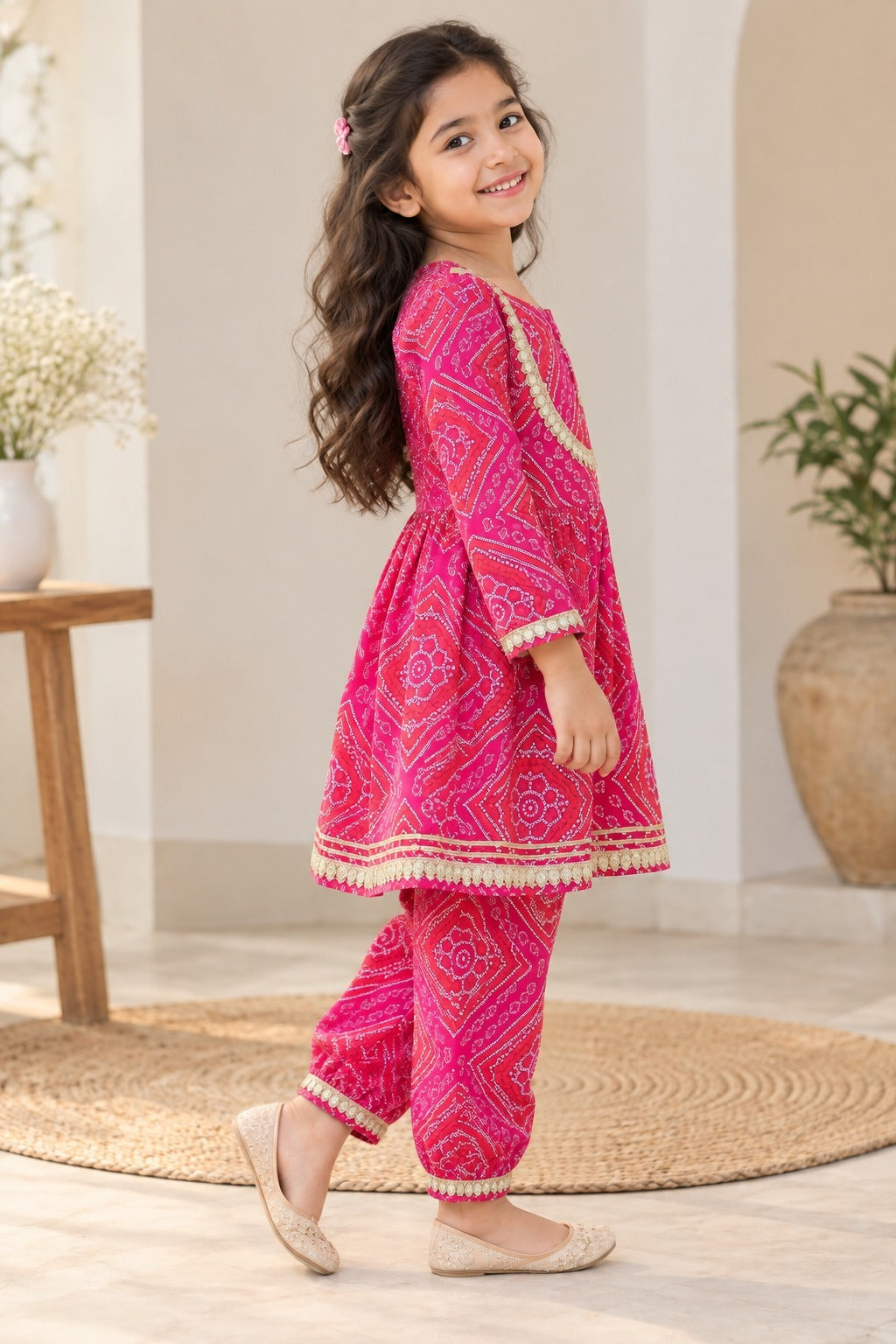 Rani Pink Bandhej Anarkali suit with Afghani Salwar