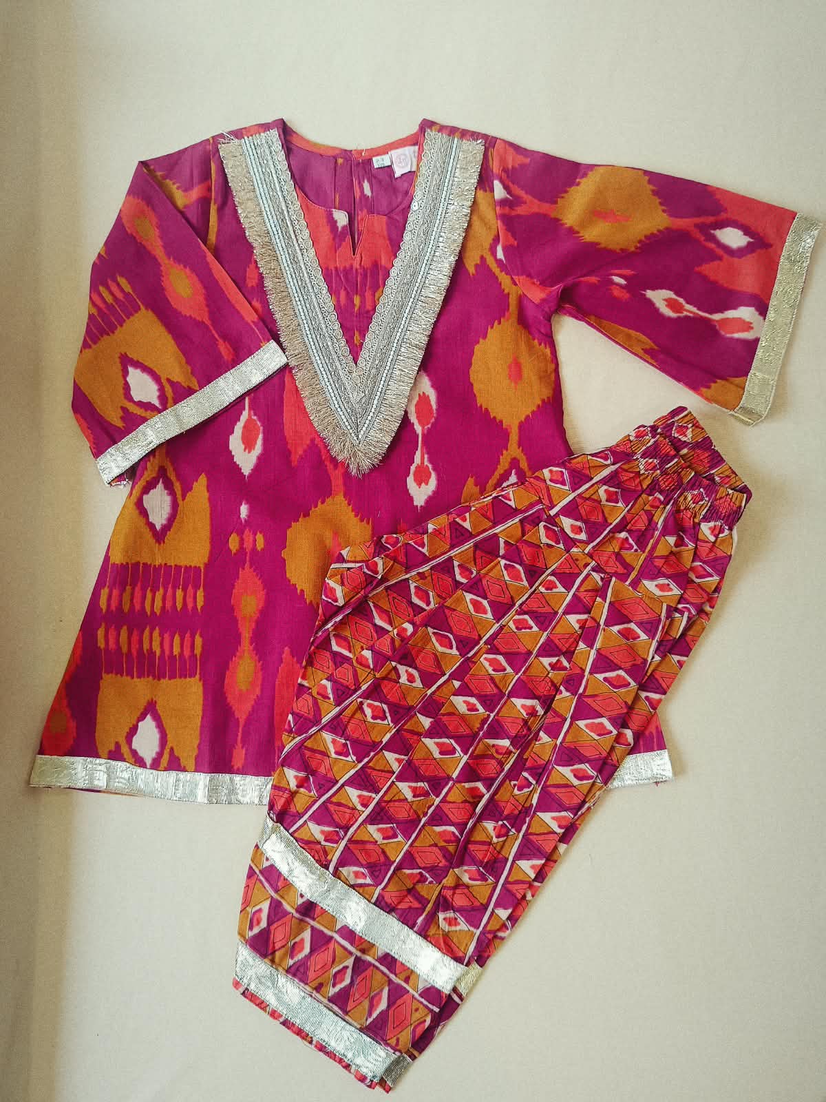 Ikkat print, Rani Pink Colored, A- Line Kurti with Farshi Salwar